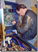 Raymond Fowkes soldering on the backboard of a Space Shuttle Pinball - DaveTavres.com